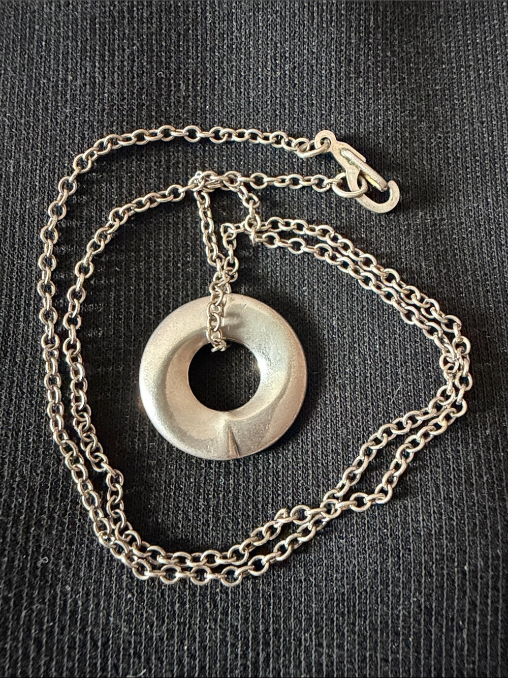 Vintage silver necklace with doughnut like pendant